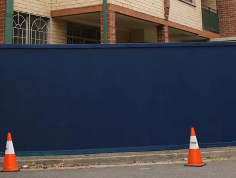 Timber 2 a blue wall with a cone in front of it